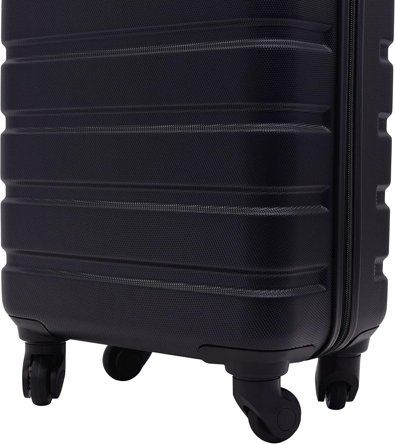 imageWrangler 215quot Spinner CarryOn Luggage Navy BlueBlack