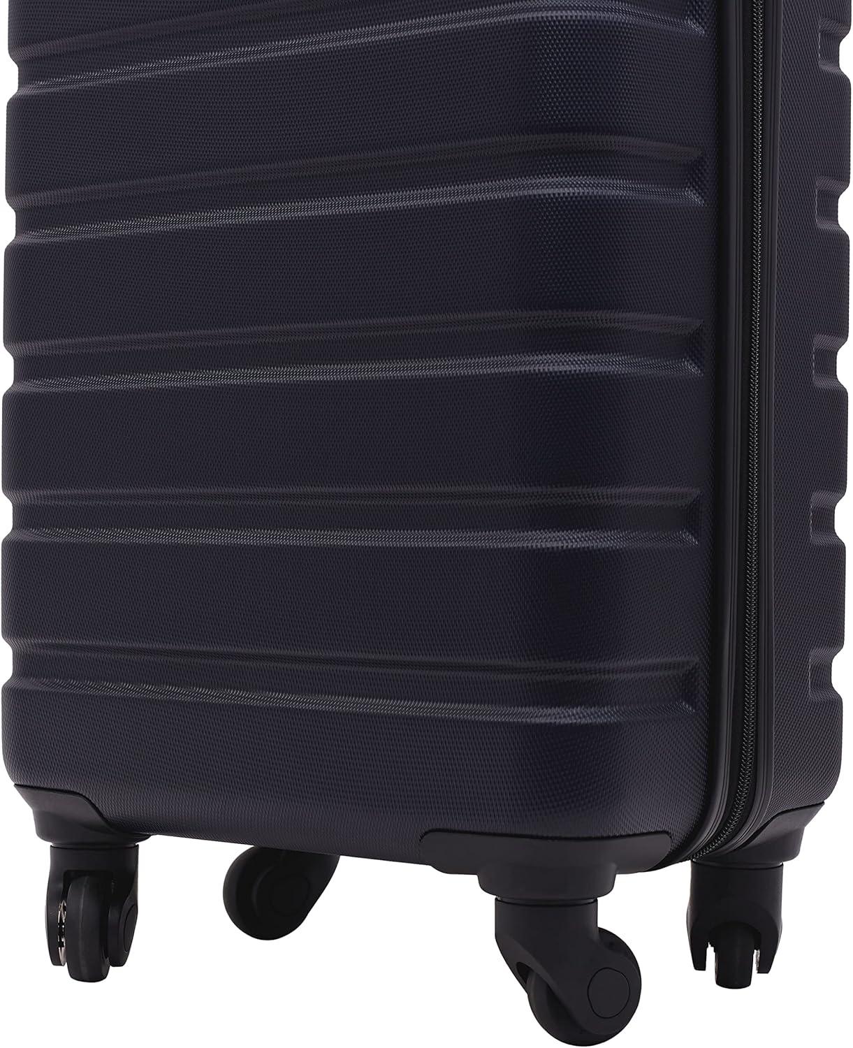 imageWrangler 215quot Spinner CarryOn Luggage Navy BlueDark Navy